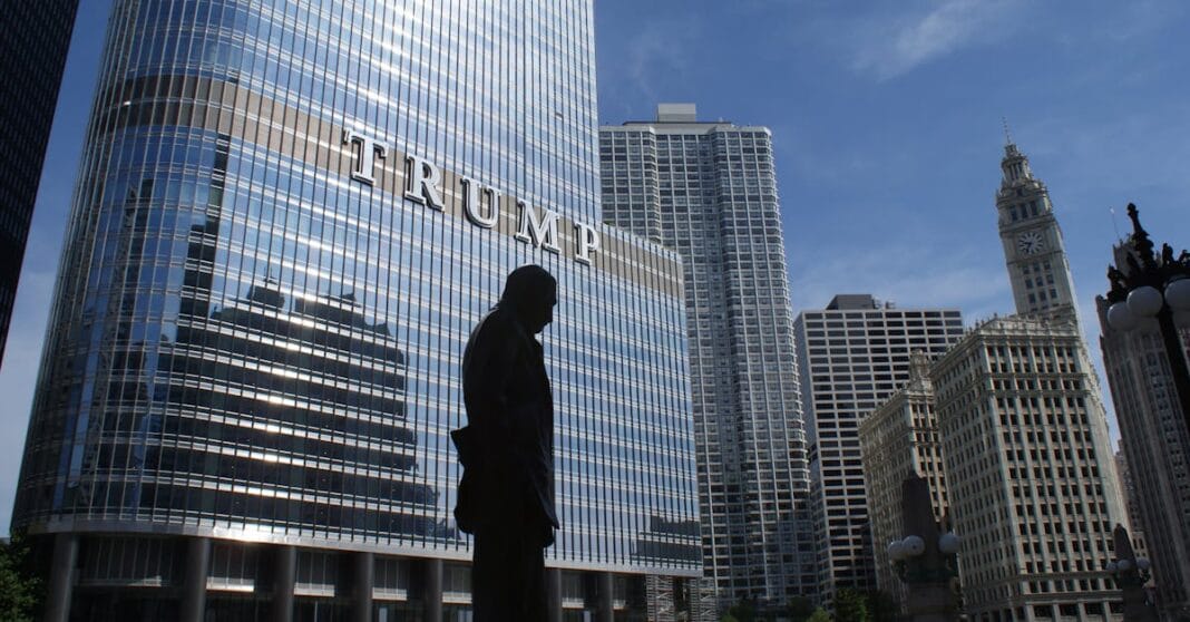 Captivating view of Chicago skyline with Trump Tower reflections and a silhouette in daylight.