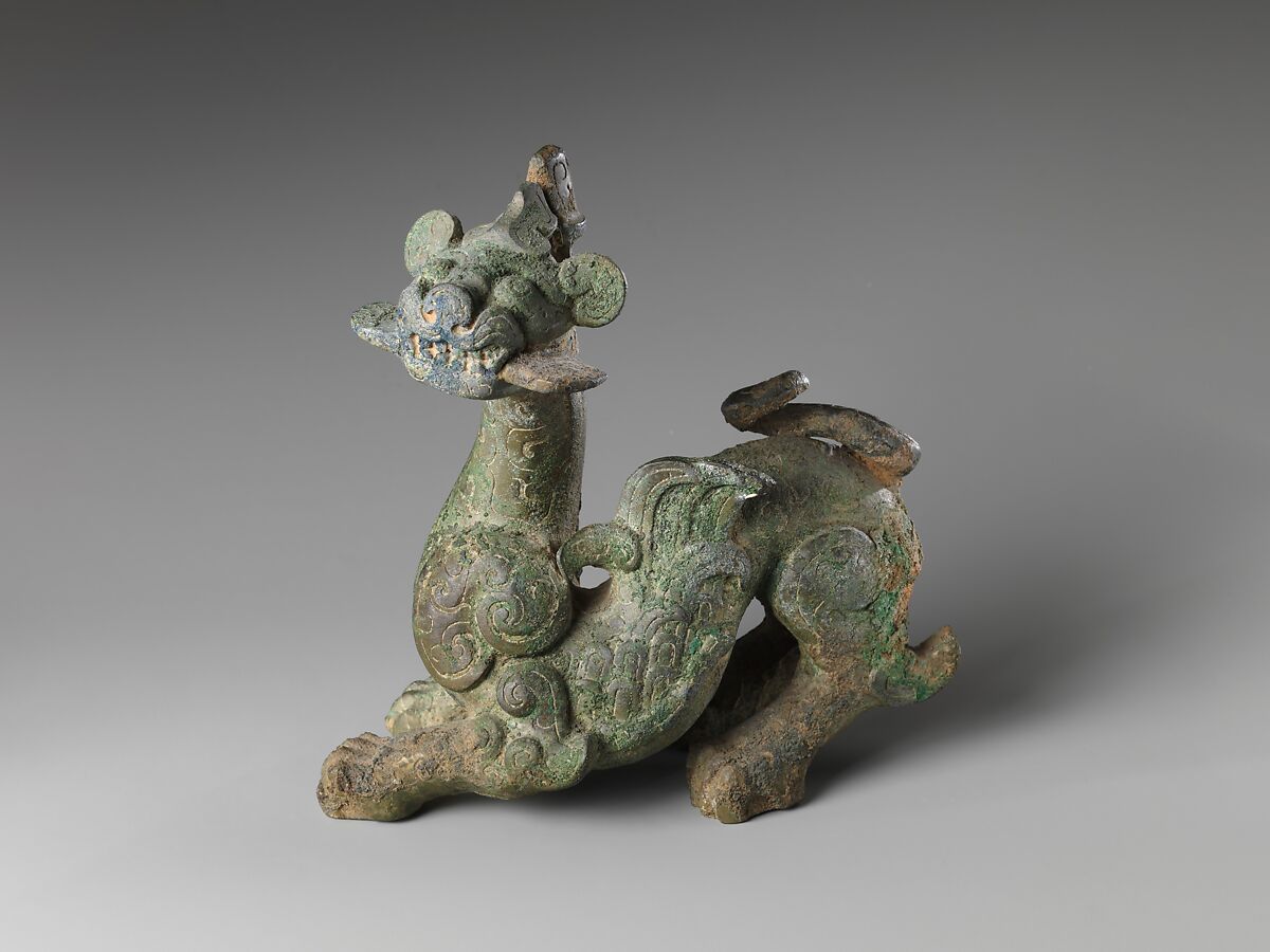 Felino alado chinês, bronze do período Zhou Oriental